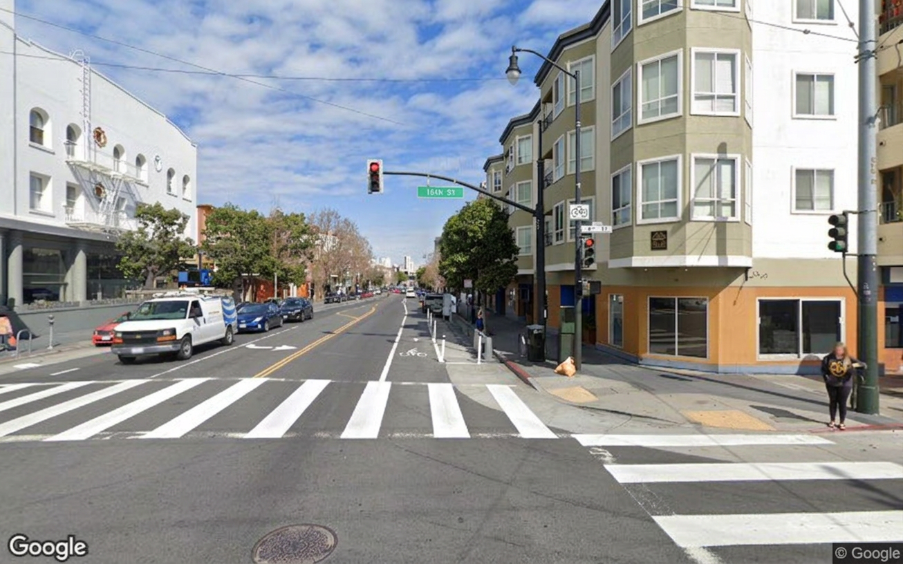 AI visualization of a proposed fix at 16th and Valencia. Not a photograph.